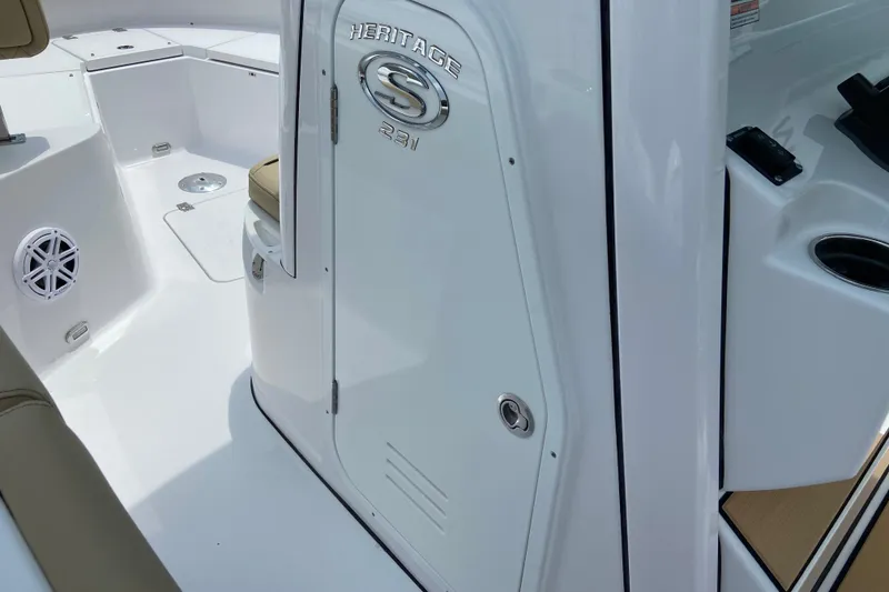 Slide: The Image of 2027 Sportsman Heritage 231 Center Console interior with seating and storage compartments. - 33
