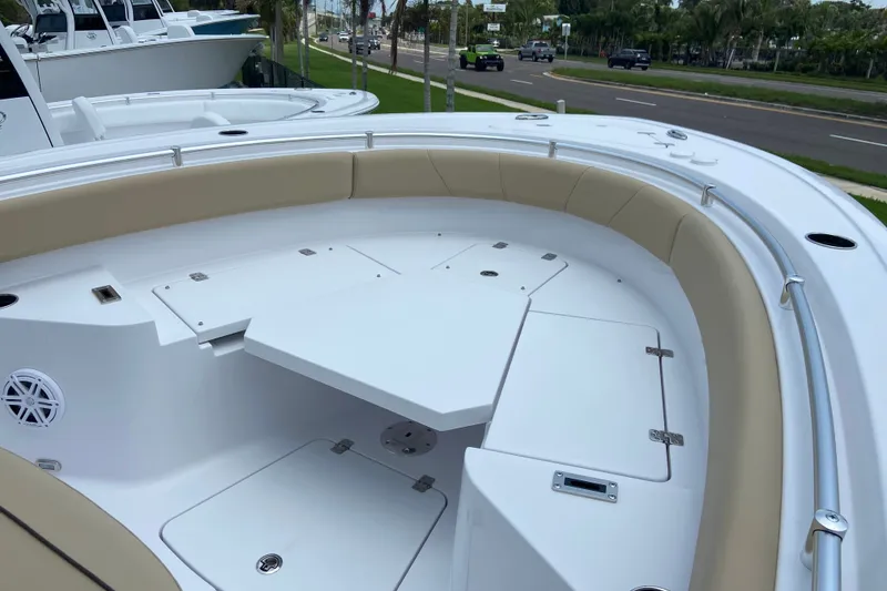 Slide: The Image of 2027 Sportsman Heritage 231 Center Console boat with spacious seating and sleek design. - 21