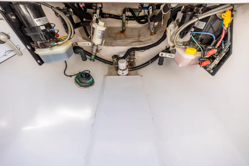 Slide: The Image of Engine compartment of 2022 Blackwater 36 Sport boat with wiring and components. - 40