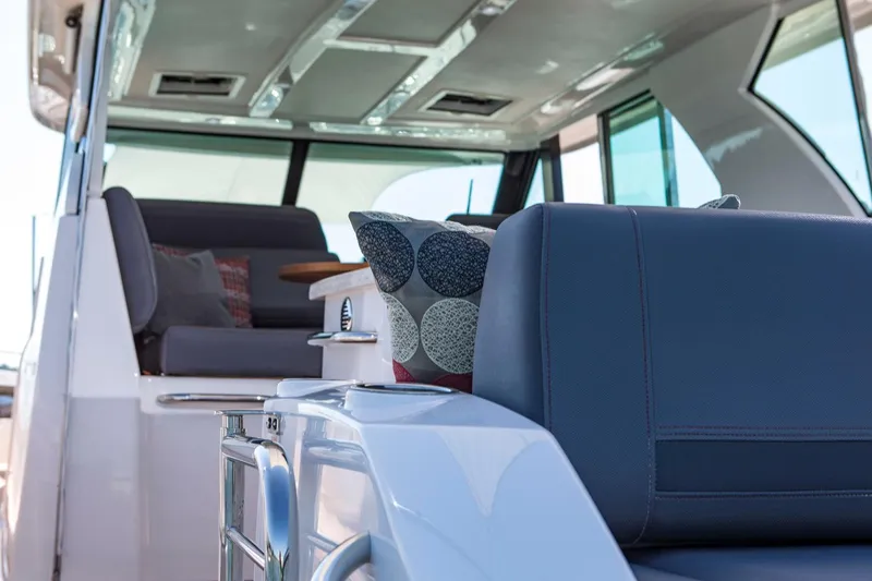 Slide: The Image of Manufacturer Provided Image: 2018 Tiara Yachts Q44 interior with modern seating and stylish decor. - 4