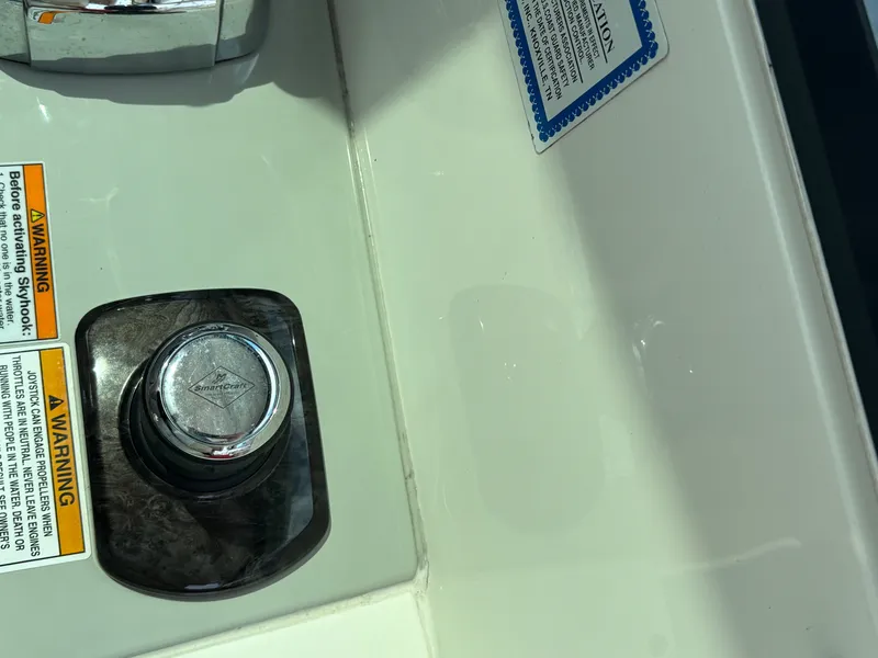Slide: The Image of Close-up of a control knob on a boat, surrounded by warning labels. - 10