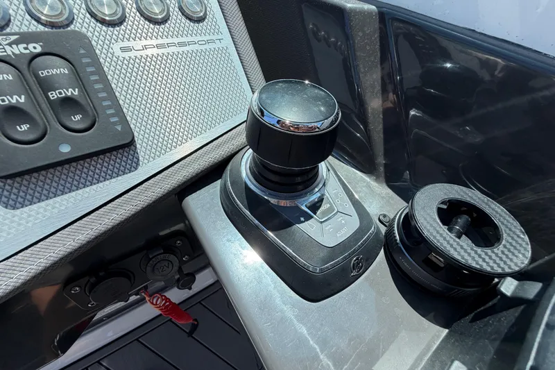 Slide: The Image of Control panel of 2023 Monterey 305SS Super Sport boat with joystick and switches. - 43