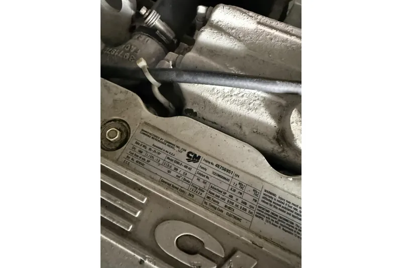 Slide: The Image of Engine detail of a 2008 Beneteau Antares 13.80 boat, showcasing manufacturer specifications. - 32