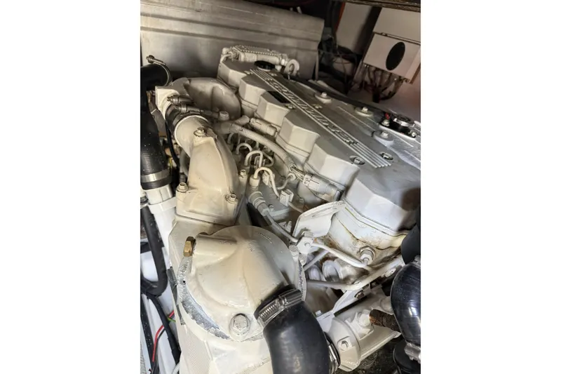 Slide: The Image of Engine compartment of a 2008 Beneteau Antares 13.80 boat, showcasing mechanical details. - 30