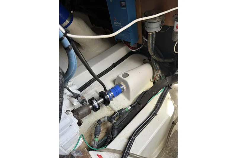 Slide: The Image of Engine compartment of 2008 Beneteau Antares 13.80, showcasing mechanical components and wiring. - 27