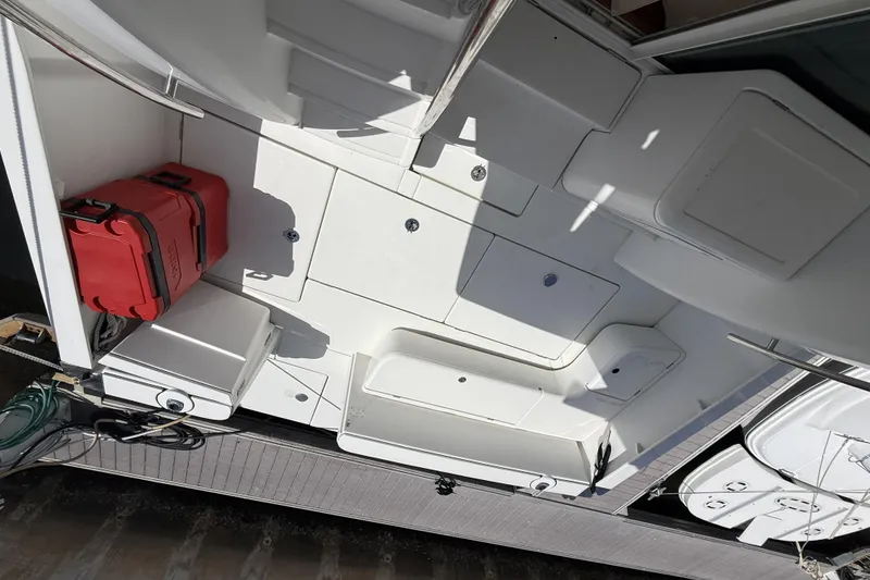 Slide: The Image of Beneteau Antares 13.80 boat deck with storage compartments and red case, 2008 model. - 11