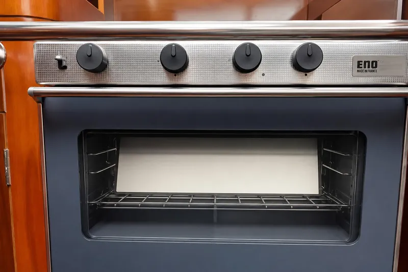 Slide: The Image of Stainless steel oven in 1996 Beneteau Oceanis 40 CC yacht kitchen. - 14
