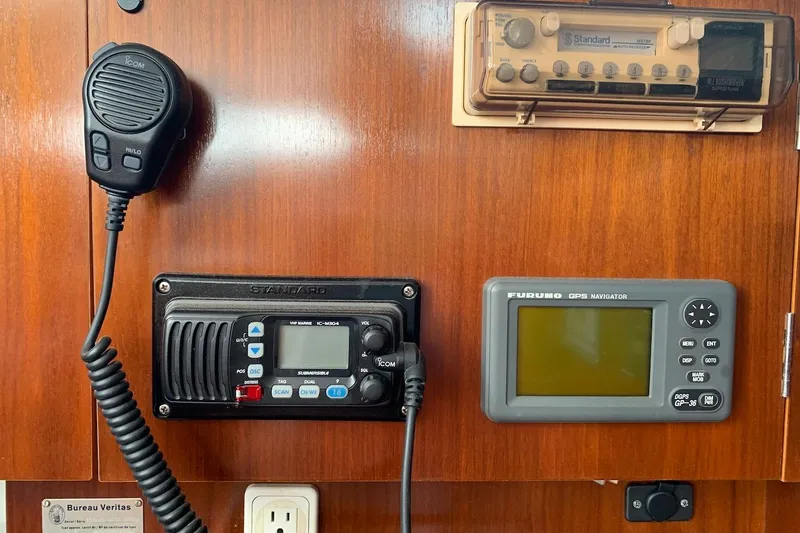 Slide: The Image of VHF radio, AM/FM radio and GPS display below - 37