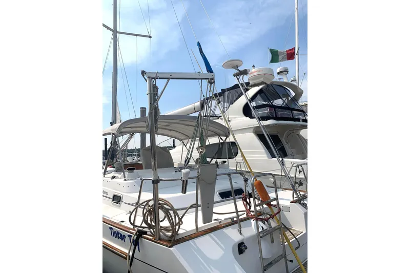 Slide: The Image of Stern showing dinghy hoist, radar mount, walk-thru transom and dinghy mount - 64