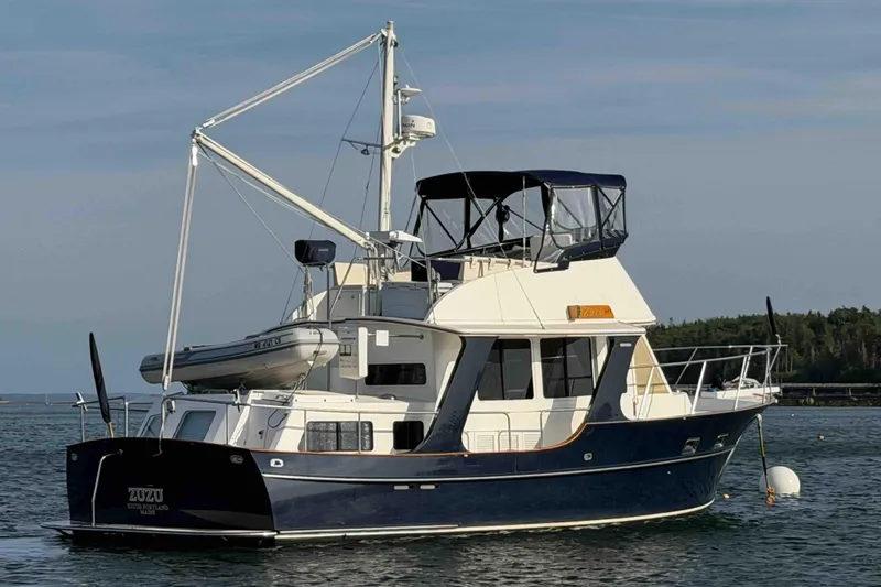 Slide: The Image of Pacific Seacraft 38T Fast Trawler, 2003 model, anchored in calm waters. - 121