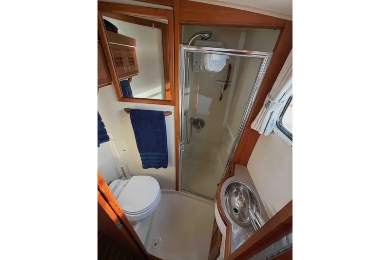 Slide: The Image of Bathroom interior of 2003 Pacific Seacraft 38T Fast Trawler with shower and sink. - 134