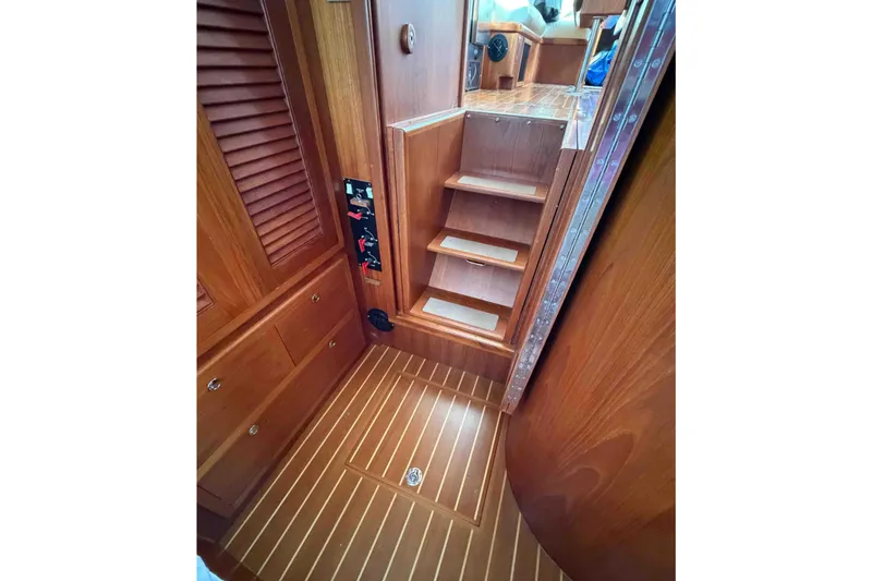 Slide: The Image of Interior of 2003 Pacific Seacraft 38T Fast Trawler with wooden stairs and flooring. - 131