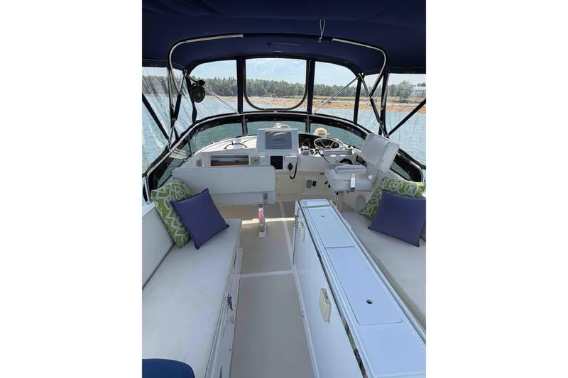 Slide: The Image of Interior view of 2003 Pacific Seacraft 38T Fast Trawler with seating and navigation equipment. - 108