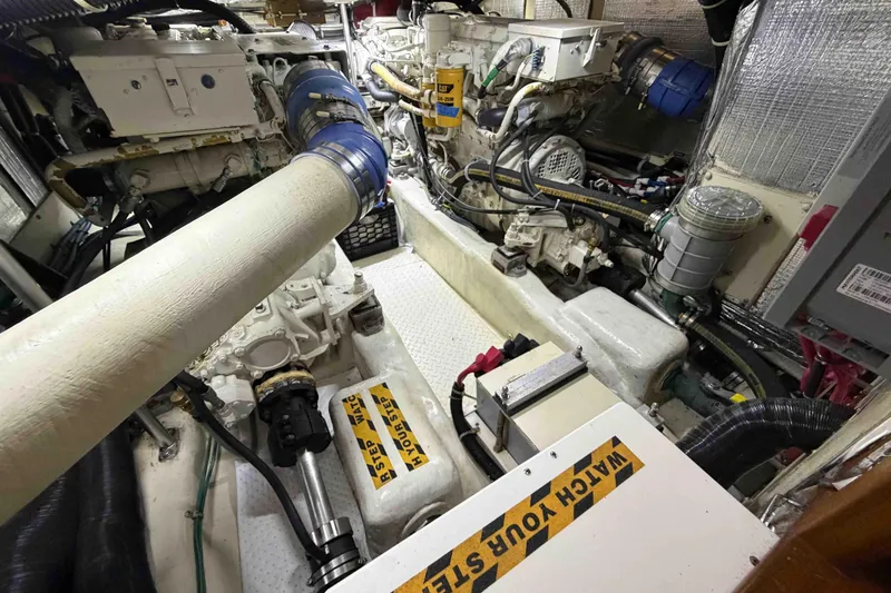 Slide: The Image of Engine room of 2003 Pacific Seacraft 38T Fast Trawler with visible machinery and components. - 138