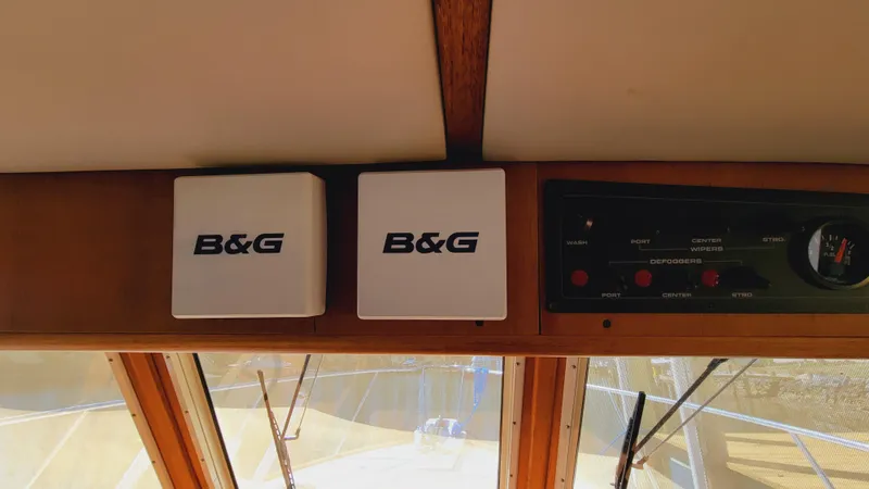 Slide: The Image of The image shows a boat's dashboard with B&G devices and a control panel. - 46