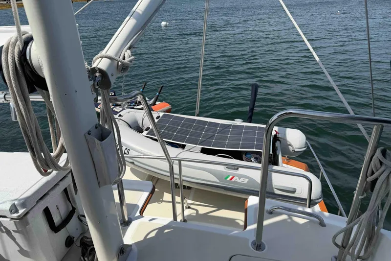 Slide: The Image of 2003 Pacific Seacraft 38T Fast Trawler with solar panels and dinghy on deck. - 116