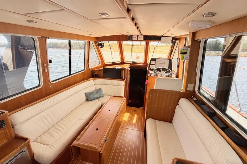 Slide: The Image of Interior of 2003 Pacific Seacraft 38T Fast Trawler with elegant wood and leather seating. - 120