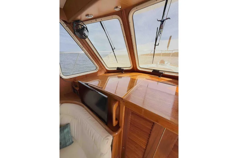 Slide: The Image of Interior of 2003 Pacific Seacraft 38T Fast Trawler with polished wood and large windows. - 119
