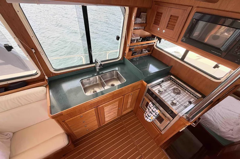 Slide: The Image of Interior of 2003 Pacific Seacraft 38T Fast Trawler with kitchen amenities. - 118