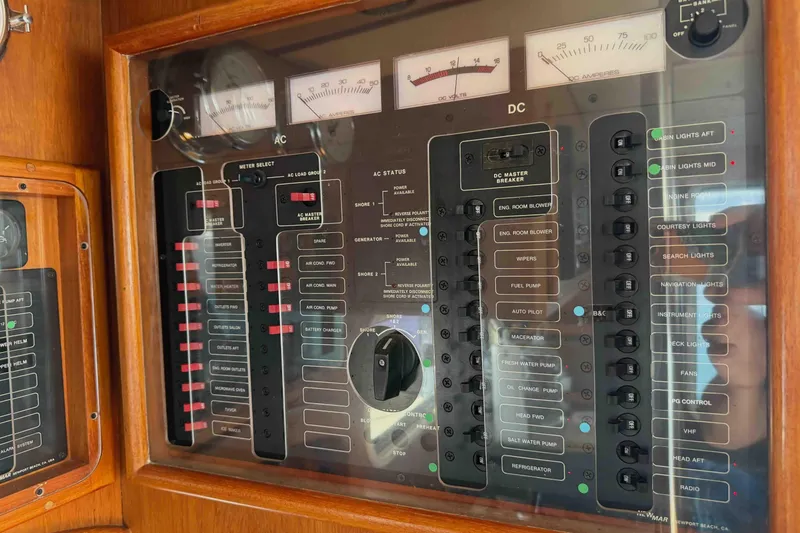 Slide: The Image of Electrical control panel on a 2003 Pacific Seacraft 38T Fast Trawler boat. - 95