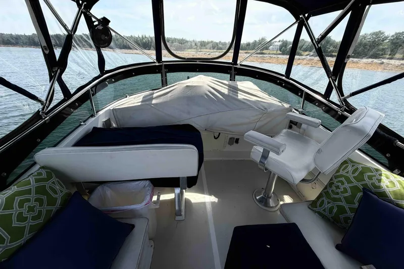 Slide: The Image of Interior view of 2003 Pacific Seacraft 38T Fast Trawler with seating and helm. - 115