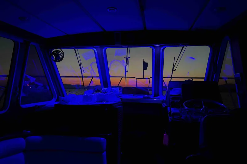Slide: The Image of Interior view of 2003 Pacific Seacraft 38T Fast Trawler at sunset, showcasing vibrant colors. - 92