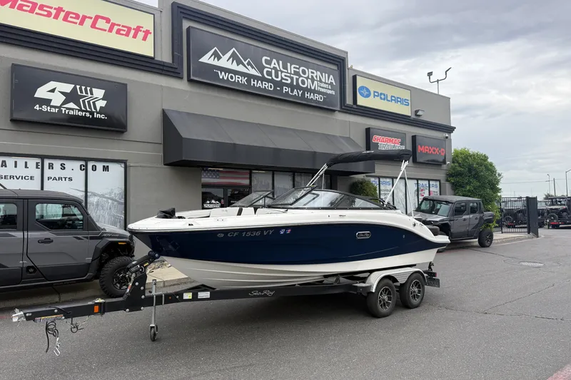 The Image of 2024 Sea Ray SPX 190 boat on trailer outside dealership, California Custom Trailers. - 0