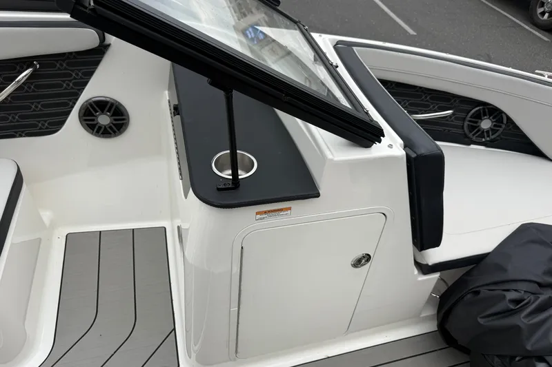 Slide: The Image of 2024 Sea Ray SPX 190 boat interior with sleek seating and modern design elements. - 21