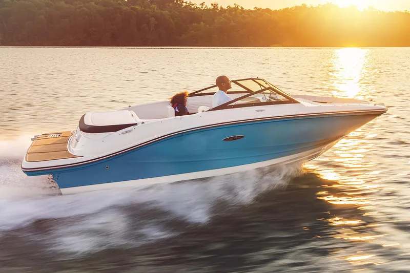 Slide: The Image of Manufacturer Provided Image: 2024 Sea Ray SPX 190 boat cruising on a lake at sunset. - 26
