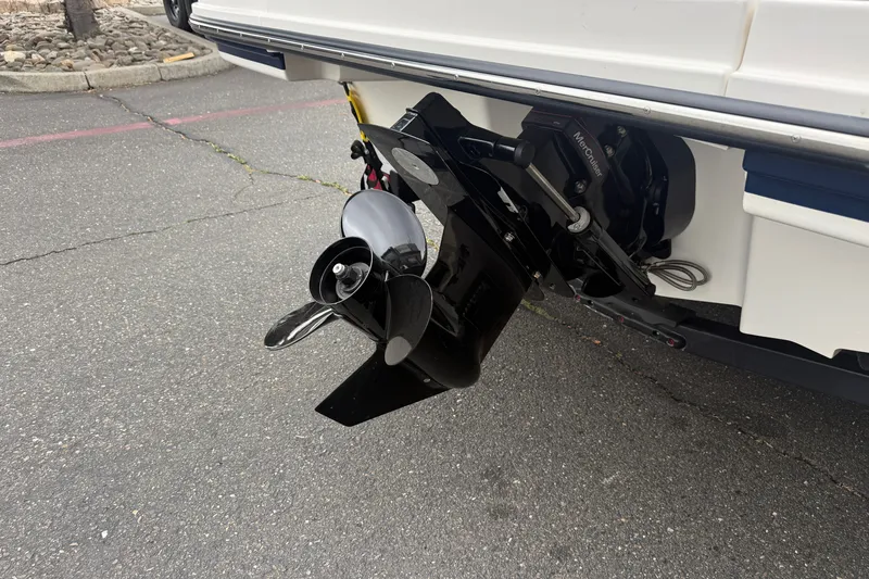 Slide: The Image of 2024 Sea Ray SPX 190 boat with MerCruiser outdrive on pavement. - 11