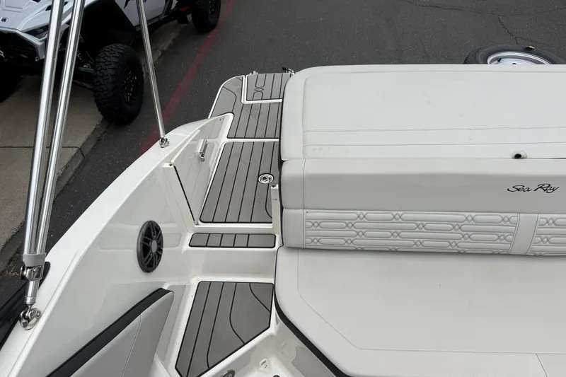 Slide: The Image of 2024 Sea Ray SPX 190 boat interior with sleek seating and modern design. - 15