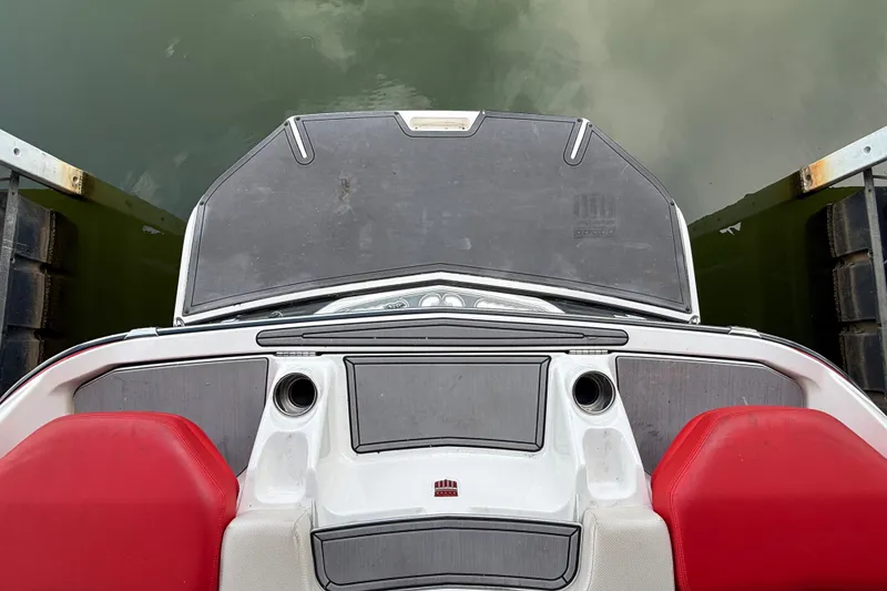 Slide: The Image of 2017 MasterCraft X23 boat stern with red seats and swim platform. - 40