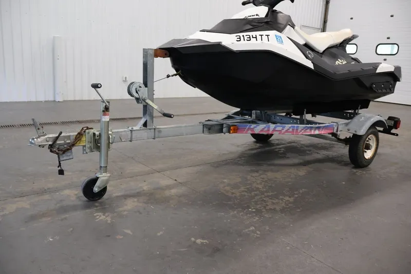 Slide: The Image of 2014 Sea-Doo Spark 3up on trailer in indoor storage facility. - 19