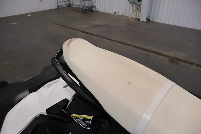 Slide: The Image of 2014 Sea-Doo Spark 3up jet ski seat in a garage setting. - 21