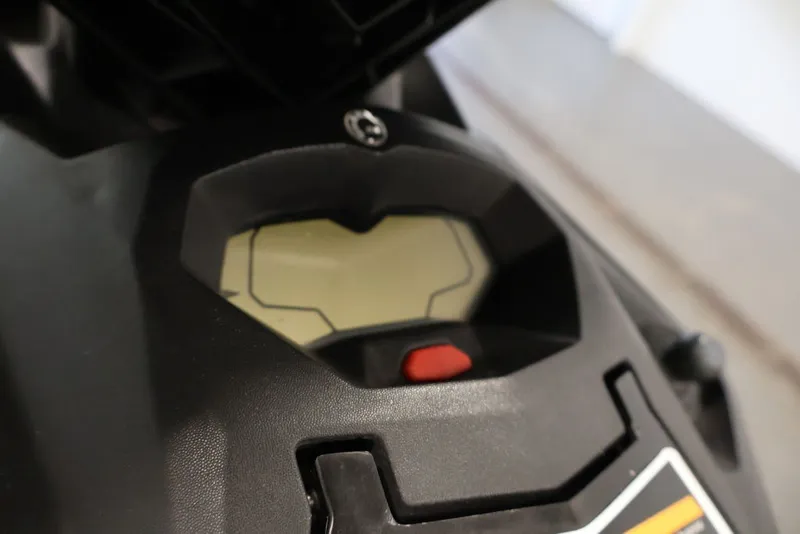 Slide: The Image of Close-up of 2014 Sea-Doo Spark 3up dashboard with digital display and red button. - 10