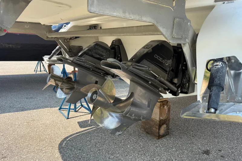 Slide: The Image of Dual propellers on a 2020 Cobalt R35 boat, displayed on stands. - 22