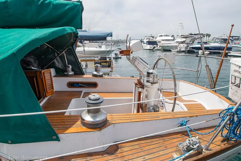 Slide: The Image of 1984 Cheoy Lee Pedrick 41 sailboat with teak deck, docked in a marina. - 4
