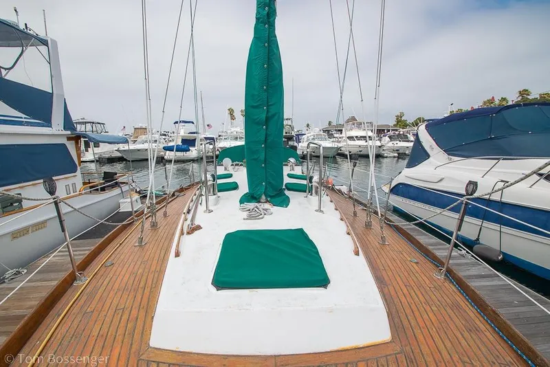 Slide: The Image of 1984 Cheoy Lee Pedrick 41 sailboat docked in a marina, surrounded by other boats. - 30