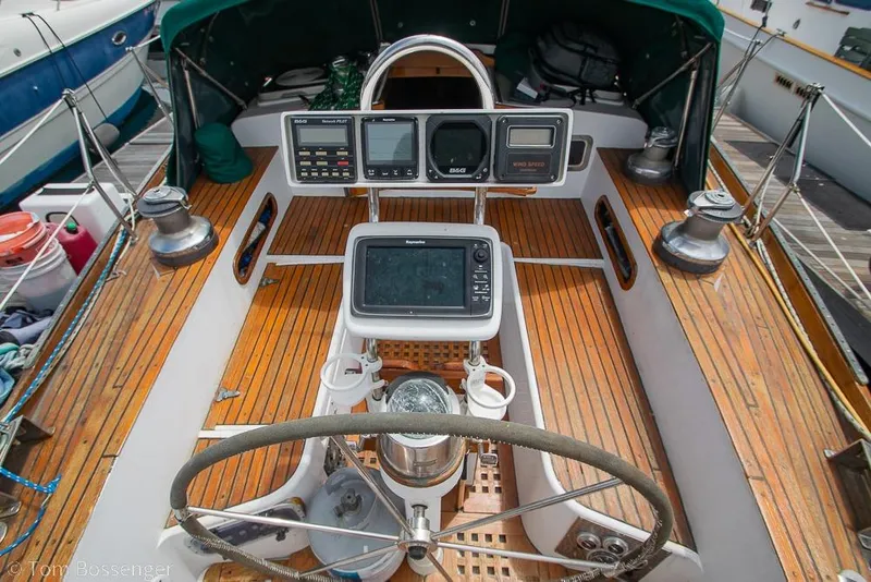 Slide: The Image of Cockpit of 1984 Cheoy Lee Pedrick 41 sailboat with navigation instruments and wooden deck. - 23
