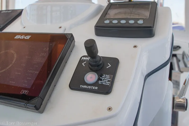 Slide: The Image of Control panel of a 2009 Hunter 50 Center Cockpit sailboat with navigation equipment. - 51