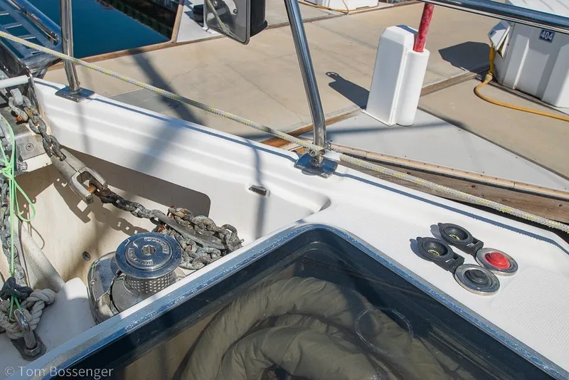 Slide: The Image of Deck view of 2009 Hunter 50 Center Cockpit sailboat, featuring anchor chain and winch. - 78
