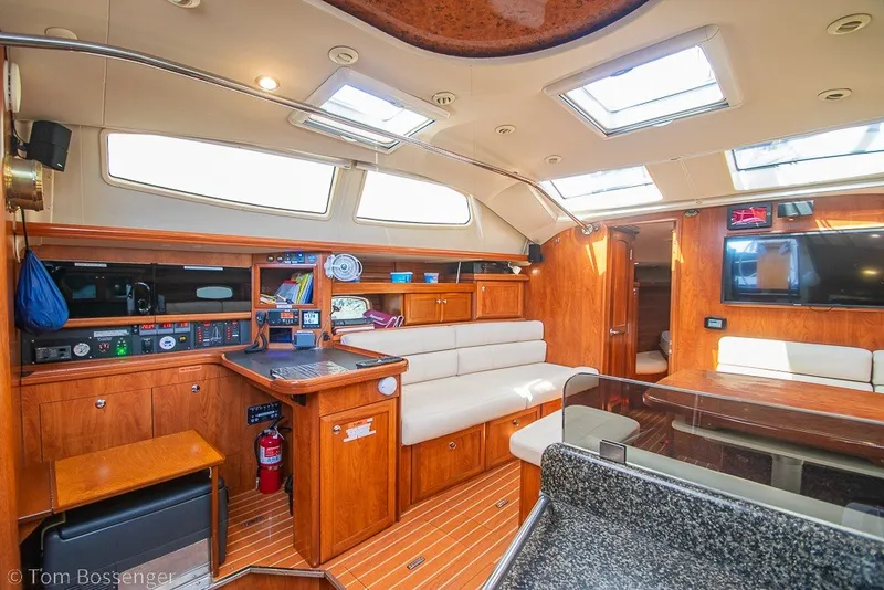 Slide: The Image of Luxurious interior of 2009 Hunter 50 Center Cockpit yacht with wood finish and skylights. - 10