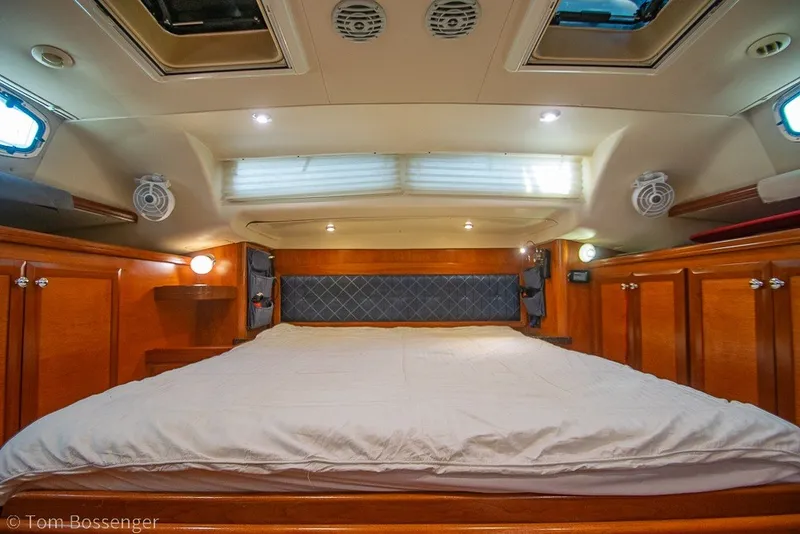 Slide: The Image of Luxurious cabin interior of 2009 Hunter 50 Center Cockpit yacht with wood finish. - 37