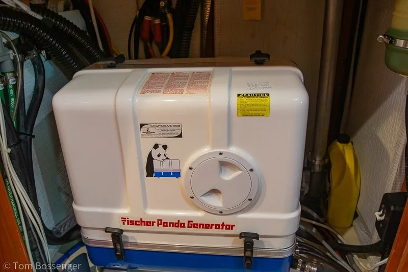 Slide: The Image of Fischer Panda generator in a 2009 Hunter 50 Center Cockpit yacht engine room. - 93