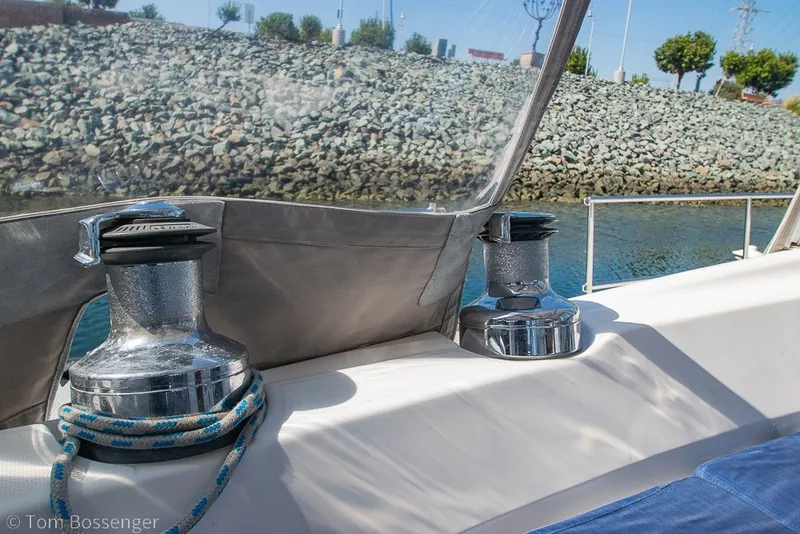 Slide: The Image of Hunter 50 Center Cockpit 2009 sailboat winches with ropes, dockside view. - 58