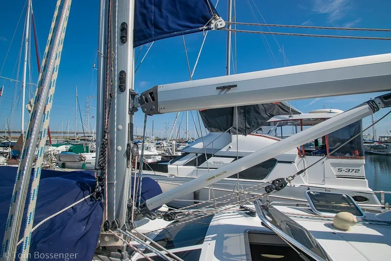 Slide: The Image of 2009 Hunter 50 Center Cockpit sailboat in marina, surrounded by other boats. - 73