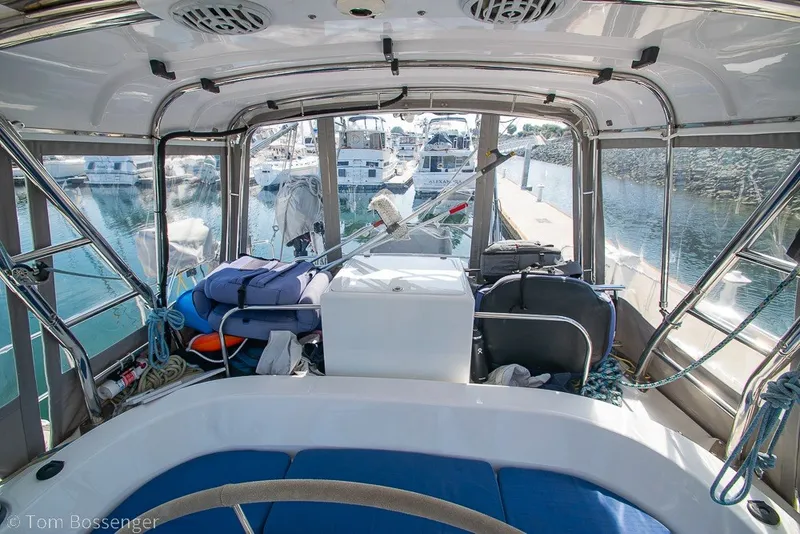 Slide: The Image of Interior view of a 2009 Hunter 50 Center Cockpit yacht docked at a marina. - 56