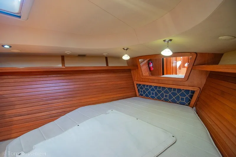 Slide: The Image of Cozy interior of 2009 Hunter 50 Center Cockpit yacht with wooden paneling and modern lighting. - 28