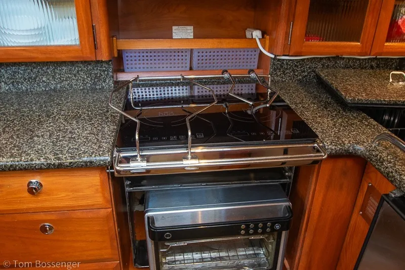Slide: The Image of Luxurious yacht kitchen with granite countertops and modern stove, Hunter 50 Center Cockpit, 2009. - 15
