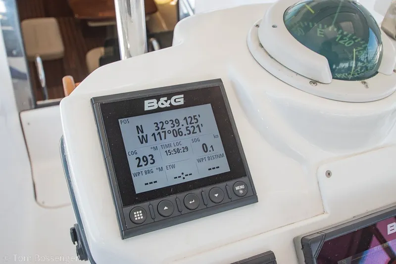 Slide: The Image of B&G navigation display on 2009 Hunter 50 Center Cockpit sailboat, showing coordinates and compass. - 54